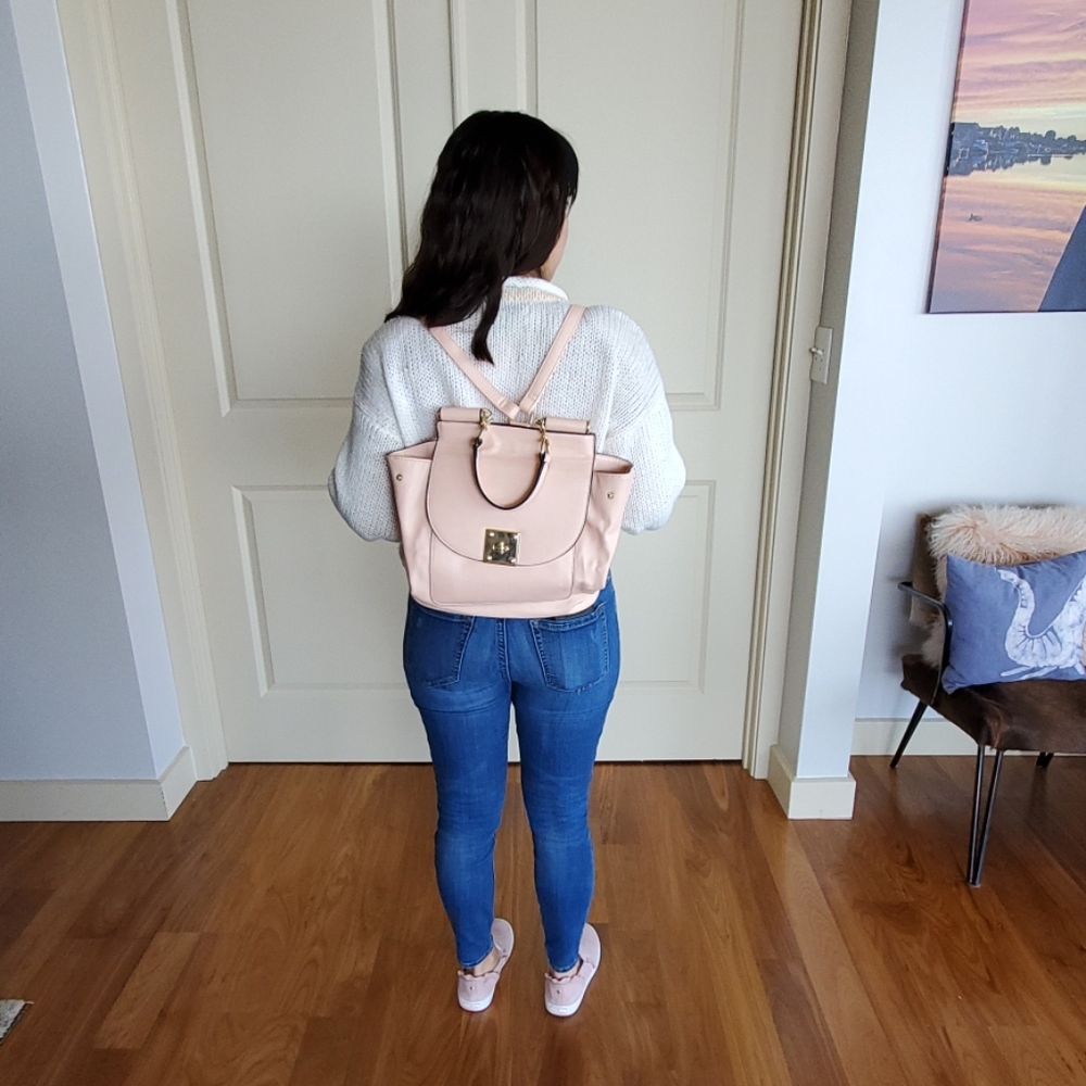 Large pink backpack purse with gold hardware